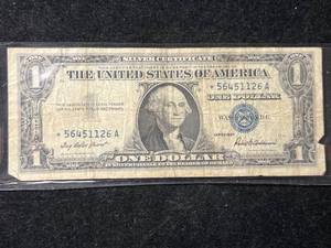 lot 102 image: 1957 US BLUE SEAL $1 SILVER CERTIFICATE STAR NOTE