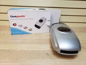 lot 22 image: Carepeutic hand-to-Wrist Warming Acupressure Massager