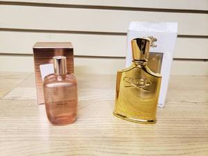 lot 25 image: Bottle of Creed Millesime Imperial perfume and Sean John Unforgiveable Woman Perfume