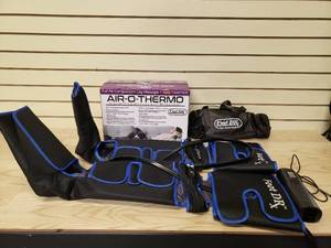 lot 29 image: Air-o-thermo cordless heated leg massager