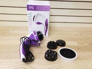 lot 31 image: Spa Sciences Prima Handheld multi purpose Body Contouring and Cellulite Massager