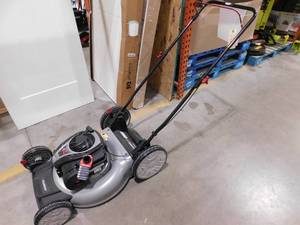lot 696 image: Murray 21 in. 140 cc Briggs and Stratton Walk Behind Gas Push Lawn Mower with Height Adjustment and Prime N Pull Start