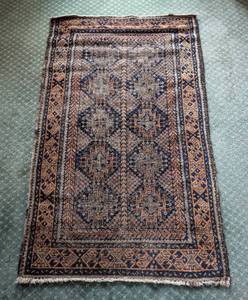lot 57 image: Vintage Handwoven Persian Rug with Geometric Patterns