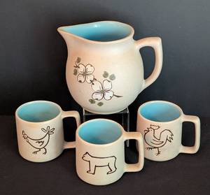 lot 132 image: Vintage Pigeon Ford Pottery Pitcher and Mugs