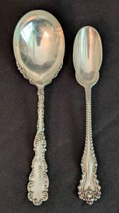 lot 138 image: Pair of Large Sterling Silver Serving Spoons