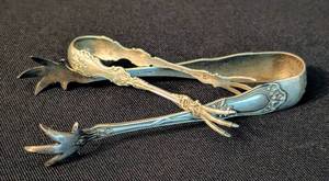 lot 22 image: Pair of Vintage Sterling Silver Claw Foot Relish  Pickle Tongs