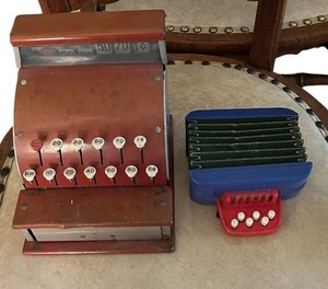lot 381 image: Vintage Red Tom Thumb Childs Cash Register 1950 and Vintage 1940S Magnus Junior Accordion Toy