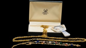 lot 465 image: Vintage Costume Jewelry Necklaces, Eileen Fisher Makeup Bag and Small Hand Held Mirror