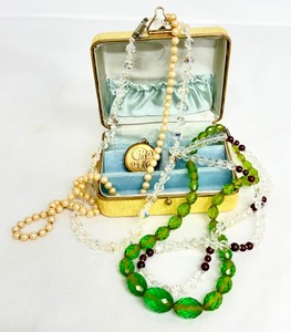 lot 22J image: Vintage Jewelry Box with Assorted Beaded Jewelry and Monogrammed Locket