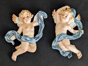 lot 429 image: Pair of Vintage Porcelain Cherub Wall Plaques