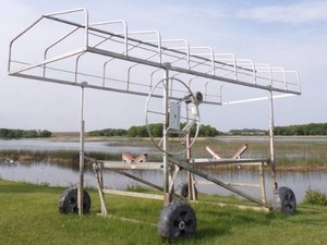 lot 9 image: Shoremaster Boat Lift 84 Wide with 19 canopy and tarp Gray