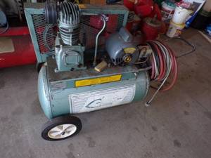 lot 24 image: Aqua blue Air Compressor