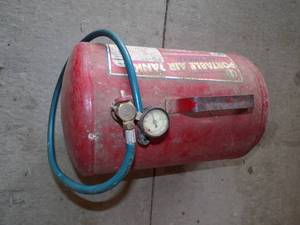 lot 23 image: Red portable Air tank