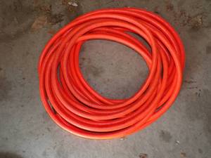 lot 36 image: Neon orange air hose