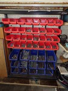 lot 46 image: Blue and Orange Containers with hardware and Tool shop shelf