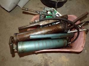 lot 49 image: Grease guns in pink container