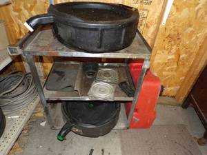 lot 100 image: Metal Cart, Oil Change container, 2 boat seat swivels, Gas Can