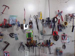 lot 228 image: Tools and Hardware on White Peg Board