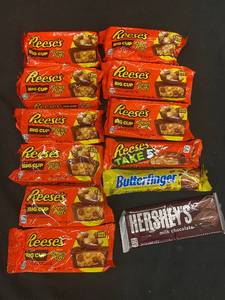 lot 73 image: BB2 - Assortment of Reeses Big Cups, Take 5, Butterfinger and Hersheys Chocolate Bars