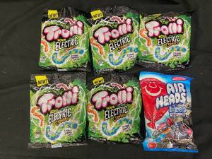 lot 134 image: VV2 - Collection of Sour Candy Packs Trolli Sour Electric Crawlers & Airheads Bites