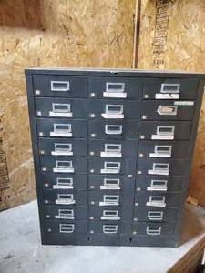 lot 60 image: 38 Tall 27 Drawer Metal Cabinet Some Hardware included