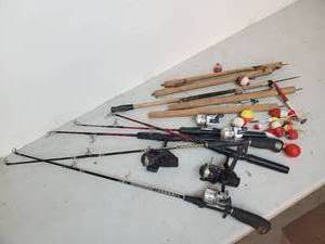 lot 108 image: Ice Fishing Reels Rods and Wooden Poles and Misc