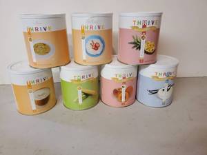 lot 127 image: 7 Canisters of Premium Thrive Freeze Dried Emergency Foods With Year 2040 Expiration Date