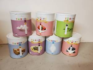 lot 128 image: 7 Canisters of Premium Thrive Freeze Dried Emergency Foods With Year 2040 Expiration Date