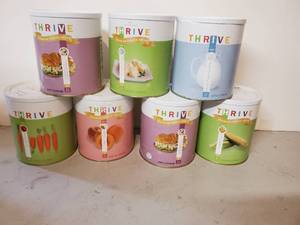 lot 129 image: 7 Canisters of Premium Thrive Freeze Dried Emergency Foods With Year 2040 Expiration Date