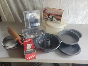 lot 155 image: Large Lot of Cake Pans Apple Peeler Cookie Presses and Rolling Pin