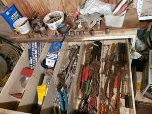 lot 193 image: Everything in Drawer of Cabinet Bring Bins to Haul away