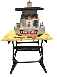 lot 5 image: Craftsman Benchtop Spindle Sander with Black and Decker Workmate Table