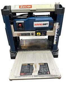 lot 42 image: Ryobi AP1301 13 Surface Planer with RapidSet Blade System