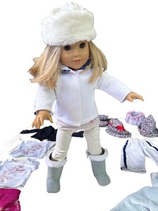 lot 216 image: American Girl Doll with Extra Clothes and Accessories