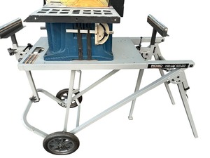 lot 48 image: Ryobi 10 BTS10 Table Saw on Ridgid Portable Work Table with Wheels
