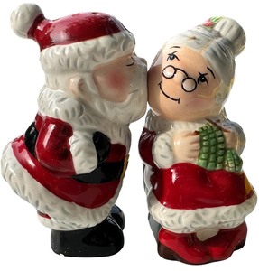 lot 429 image: Santa Kissing Mrs. Claus Salt and Pepper Shakers
