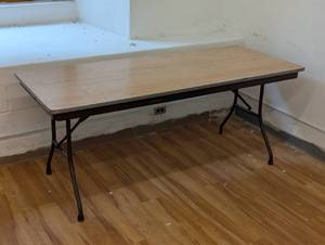 lot 25 image: 6 Foot Folding Table - Solid