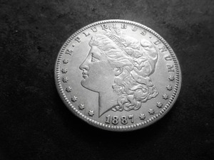 lot 9 image: 1987 S Morgan Silver Dollar