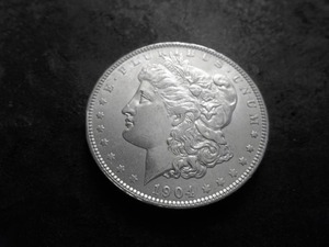 lot 19 image: 1904 O Morgan Silver Dollar