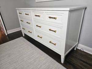 lot 44 image: Contemporary 9 Drawer Dresser from Marshal Fields with Modern Brass Drawer Pulls