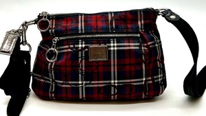 lot 11 image: Coach Fabric Handbag with Red Plaid Design and Black Strap