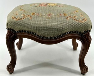 lot 38 image: Vintage Wooden Upholstered Footstool with Floral Needlepoint Design