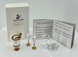 lot 42 image: Swarovski Crystal Memories Classics Set with Swan and Champagne Glasses Miniatures