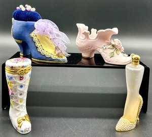 lot 49 image: Collection of 4 Ceramic Shoe Figurines including Perfume Bottle