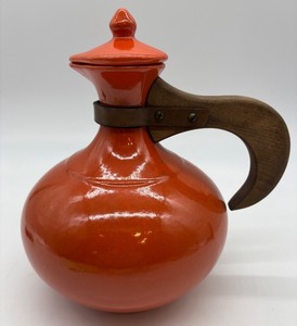 lot 70 image: Vintage Bauer Pottery Orange Pitcher with Wooden Handle