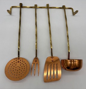 lot 87 image: Set of 4 Copper and Brass Hanging Kitchen Utensils with Wall Rack