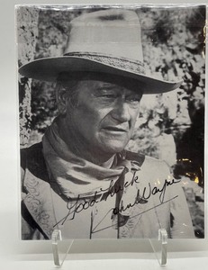 lot 112 image: John Wayne Autographed Black and White Photograph