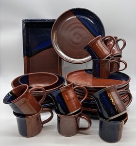 lot 116 image: Artisan Handmade Stoneware Dinnerware Set by Ann Johnson 