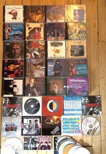 lot 192 image: Collection of Over 35 Music CDs with Metal Storage Box