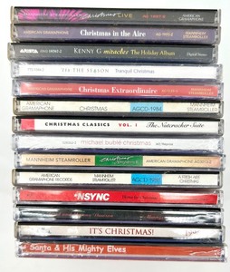 lot 218 image: Collection of 14 Christmas Music CDs featuring Mannheim Steamroller and More